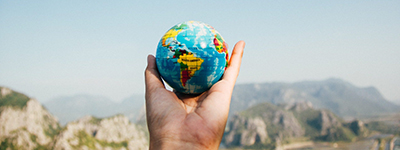 Globe held in a hand