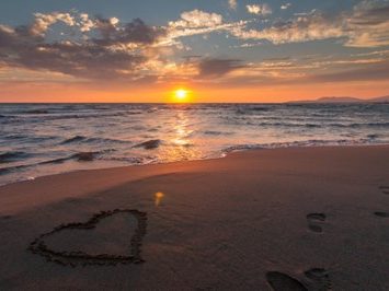 Sunset at the beach in the summer