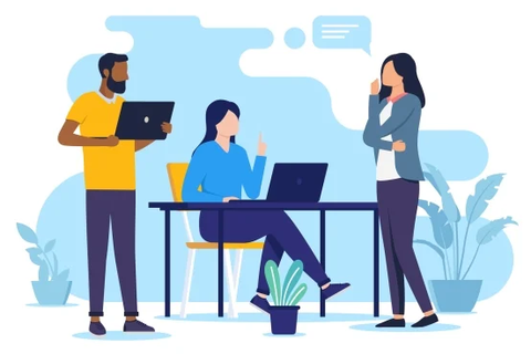 An illustration of three young professionals conversing in an office environment: a woman is seated at a desk in front of a laptop, while two colleagues—a man holding a second laptop and another woman—stand next to the desk, seemingly deeply engaged in a discussion.