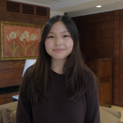 Female student smiling for the camera